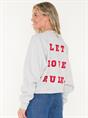 SWEAT RELAXED RAGLAN GRAPHIC